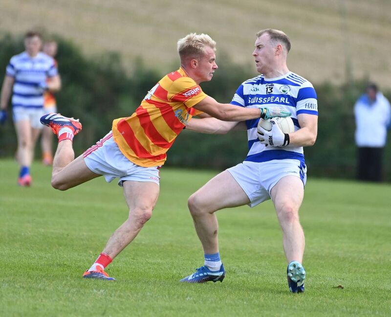 Castlehaven's Cathal Maguire is tackled by Newcestown's Richard O'Sullivan. Picture: Eddie O'Hare Castlehaven's Cathal Maguire is tackled by Newcestown's Richard O'Sullivan. Picture: Eddie O'Hare