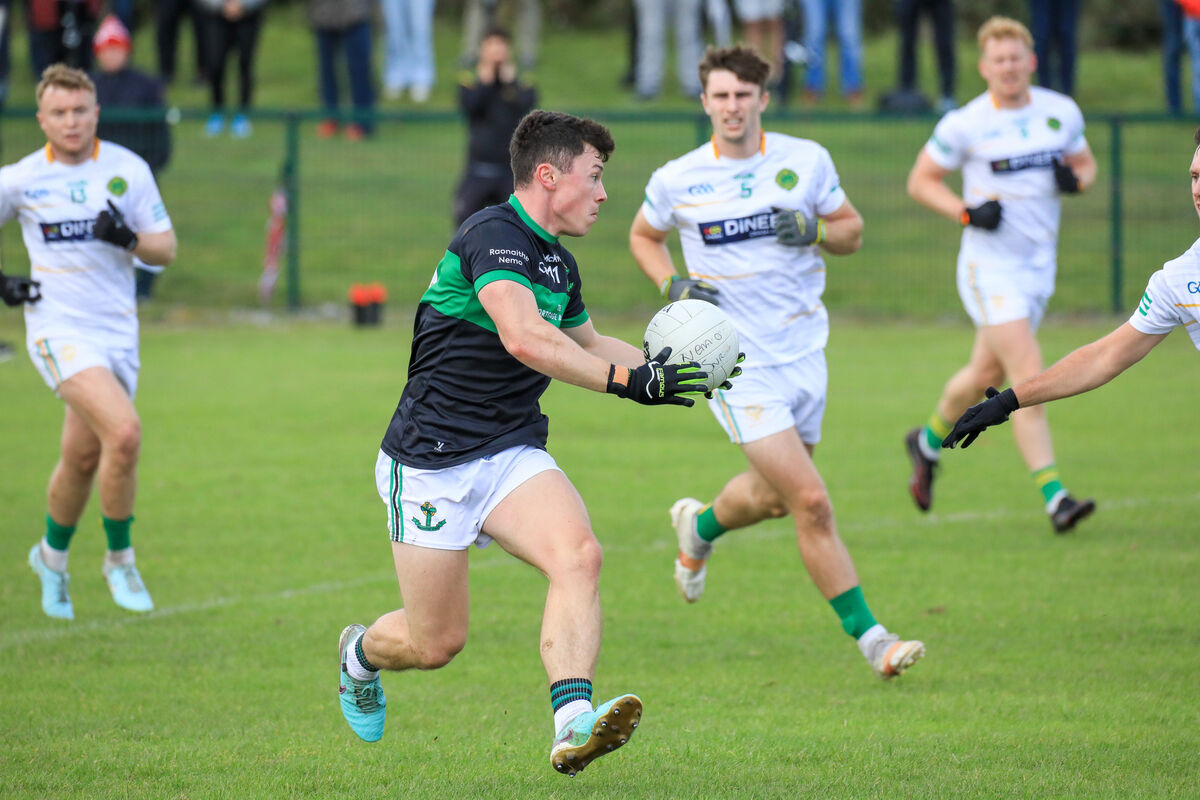 Nemo's Mark Cronin breaks down the wing against St Michael's. Picture: David Creedon