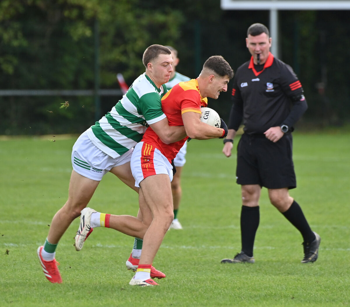  Seán McDonnell, Mallow, is tackled by Jacob O'Driscoll, Valley Rovers. Picture Dan Linehan