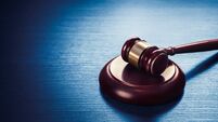 judge gavel on a blue wooden background