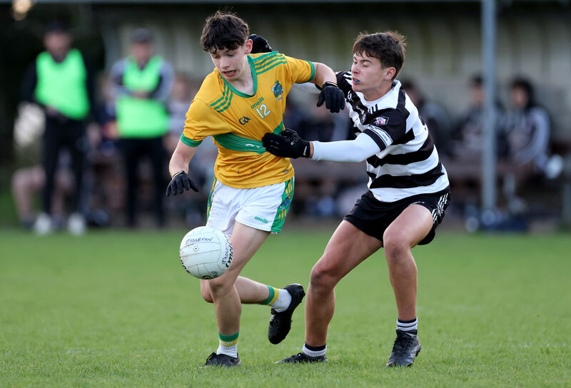 Liam Cronin, Midleton, tackles Donagh Healy, Glanmire. Picture: Jim Coughlan. Liam Cronin, Midleton, tackles Donagh Healy, Glanmire. Picture: Jim Coughlan.