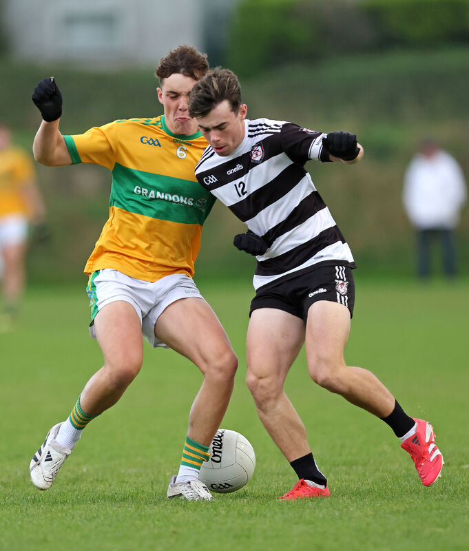 Liam Walsh, Midleton and Aaron O'Sullivan, Glanmire battle for possession. Picture: Jim Coughlan. Liam Walsh, Midleton and Aaron O'Sullivan, Glanmire battle for possession. Picture: Jim Coughlan.