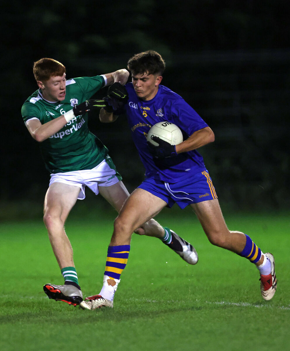 Éanna Lynch, Ballincollig, tries to tackle Edmund Burke, St Finbarrs. Picture: Jim Coughlan.