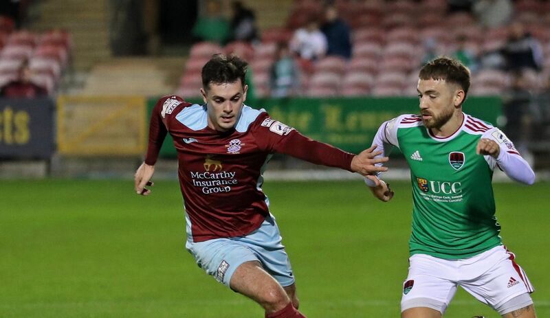 Dylan McGlade, Cork City in action against Pierce Phillips, Cobh Ramblers in the Munster Senior Cup Final at Turner's Cross.