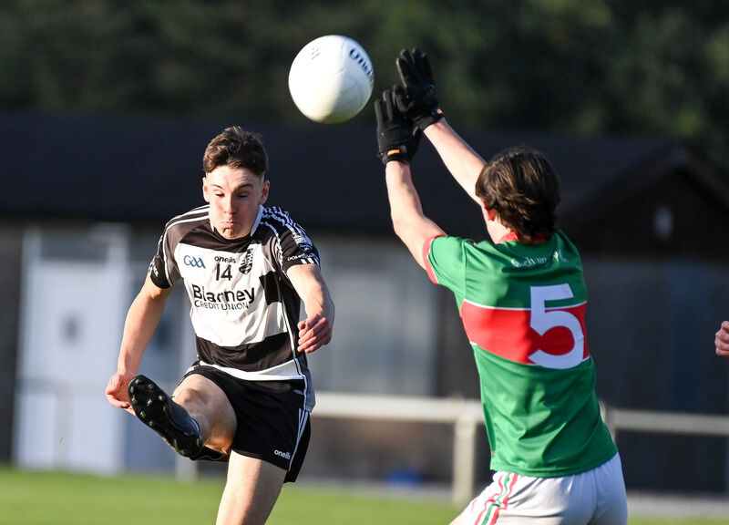  Donoughmore's Daniel Holland scores a point past Clonakilty's Derry O'Donovan during their Premier 2 MFC clash at the Mardyke. Picture: David Keane