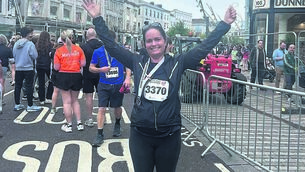 <p class="contextmenu internal_Caption">Lynn McCarthy after completing the Cork City 10k earlier this year. She is now asking people to sign up for this weekend’s The Echo Women’s Mini Marathon</p>