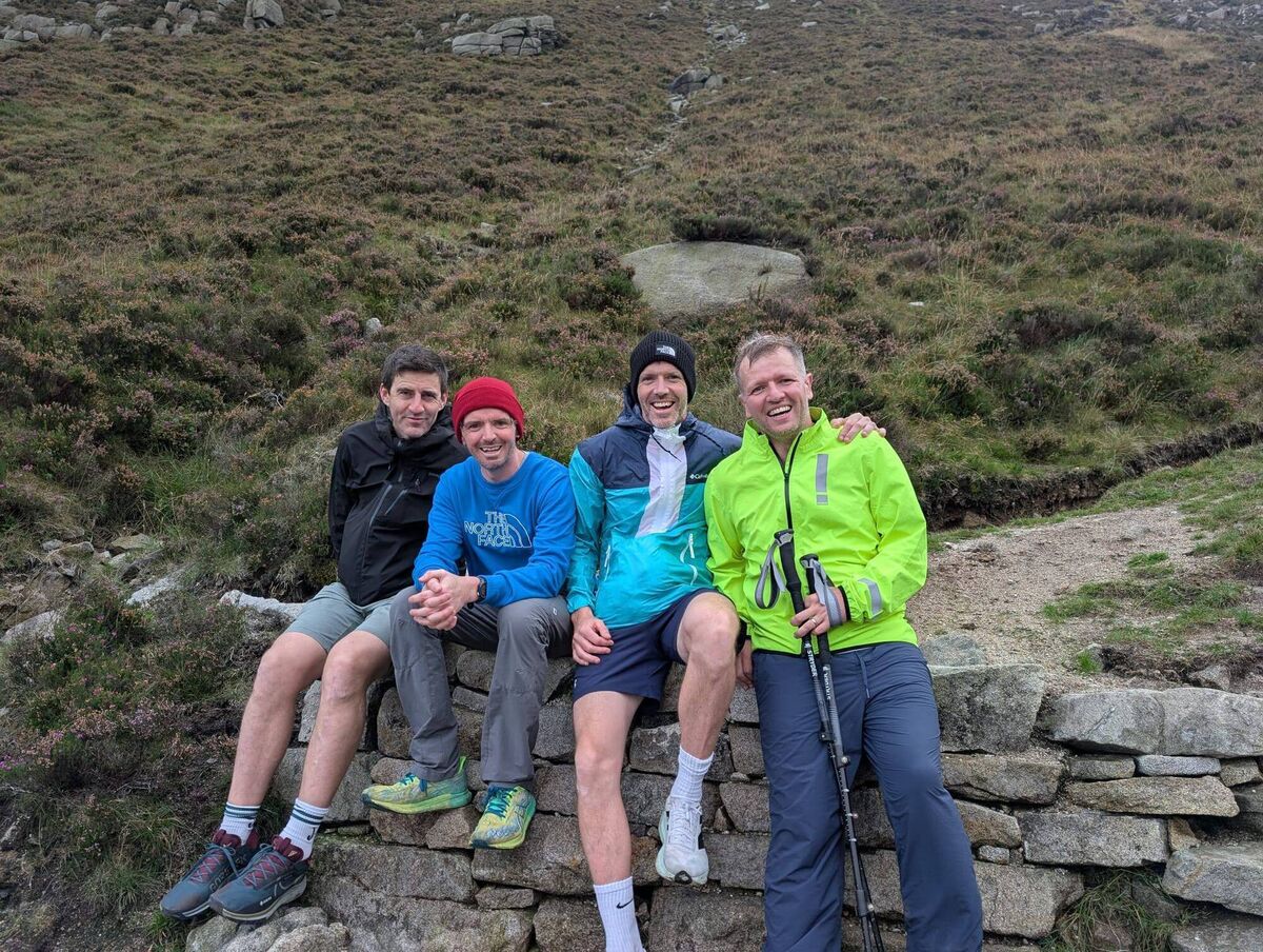 Emmet Leahy, Allan Russell, Mark Russell and Damien Delea during their four-peak challenge on Slieve Donard.