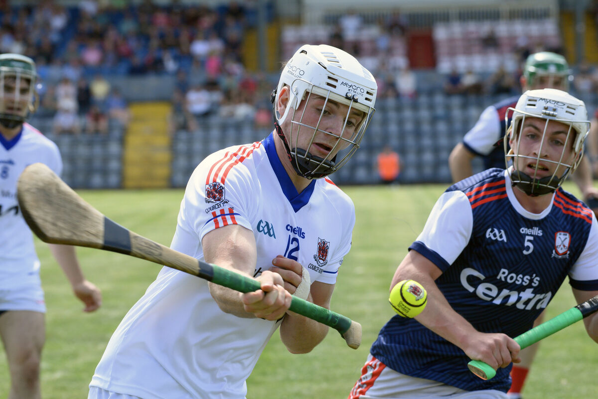  Daniel O'Donovan, Courcey Rovers, breaking past Ian O'Callaghan, Watergrasshill, at Páirc Uí Rinn. Picture: Dan Linehan