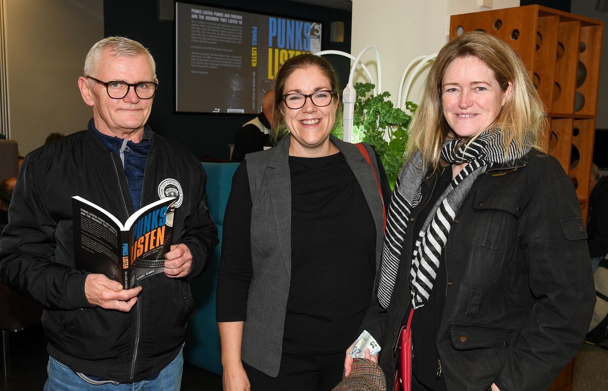 Ricky Dineen of Big Boy Foolish, chatting with Siobhan Bardsley of Cork Zine Archive and Fiona O’Mahony of Conjun Box, at the launch in 2022 of Punks Listen at the Boole Library in UCC.	Picture: David Keane.