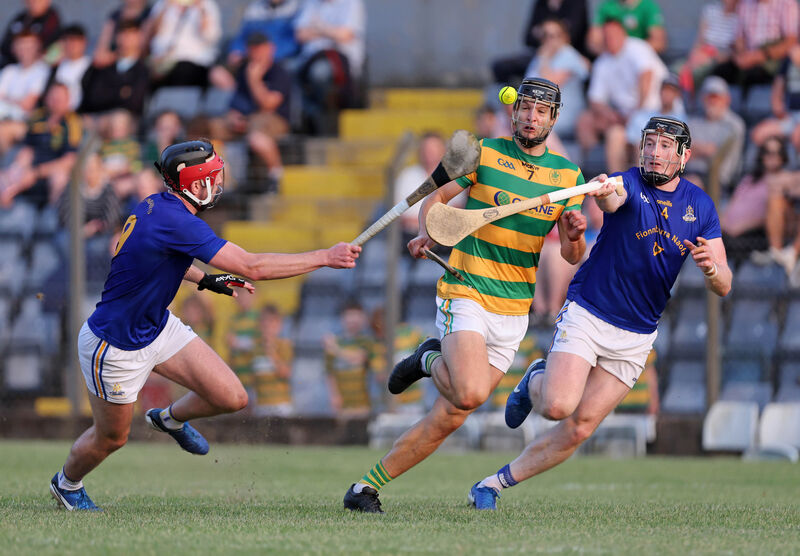 Tadhg Deasy of Blackrock in action against St Finbarr's pair Ethan Twomey and Damien Cahalane.