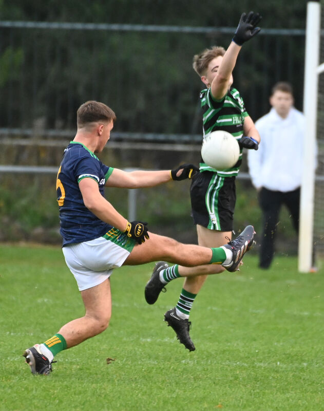 Glanmire's Cathal Galvin shoots past Douglas' Tadhg Curtin. Picture; Eddie O'Hare