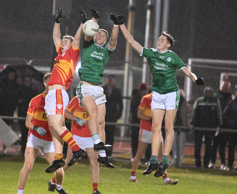 Ballincollig's Luke O'Mahony and Brian Cronin and Éire Óg's Jack O'Connell go high for the ball. Picture: Eddie O'Hare