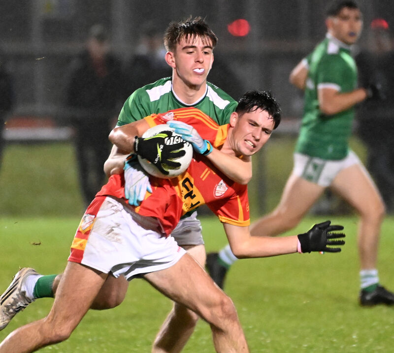 Éire Óg's Seán Murphy is tackled by Ballincollig's Darragh Crowley. Picture: Eddie O'Hare