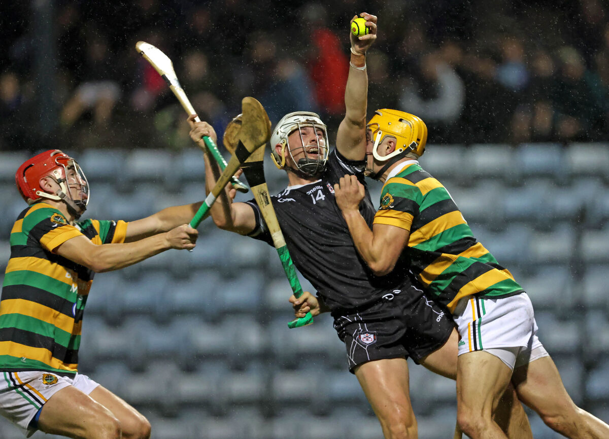 Glen Rovers pair Conor McCarthy and Micheál Mullins put pressure on Midleton's Cormac Beausang. Picture: Jim Coughlan