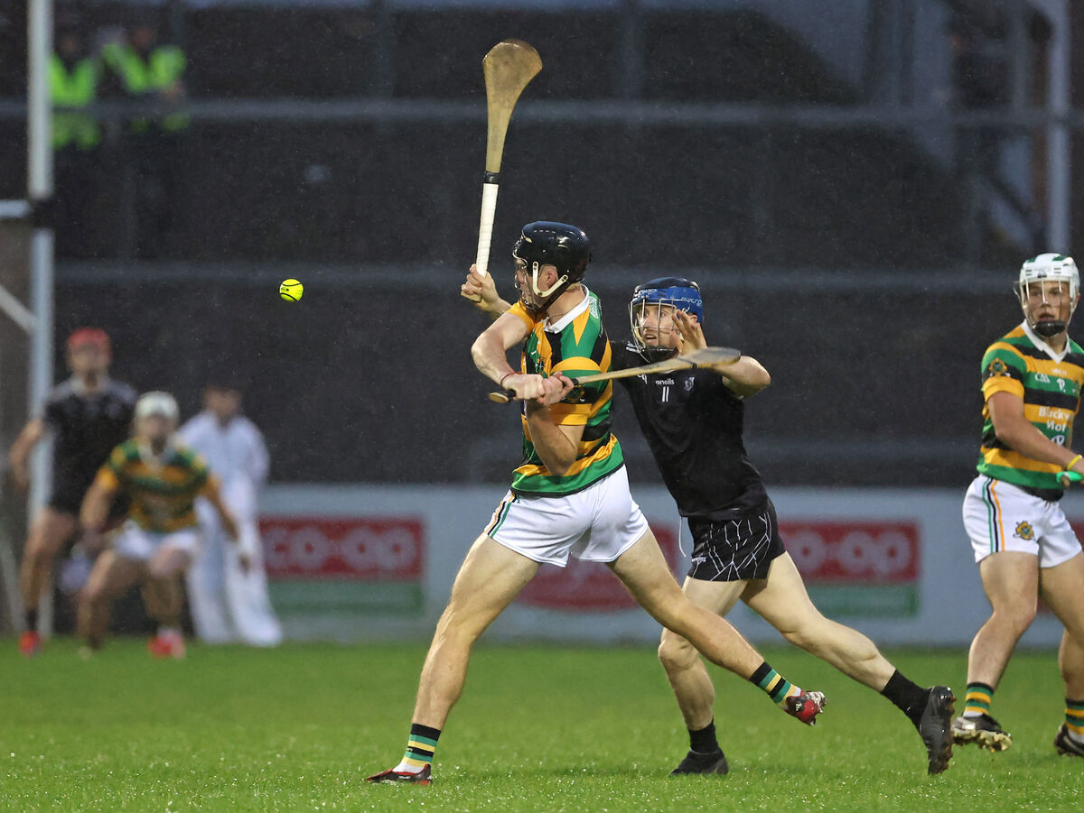  Eoin Downey of Glen Rovers gets a shot away as Midleton's Conor Lehane closes in. Picture: Jim Coughlan