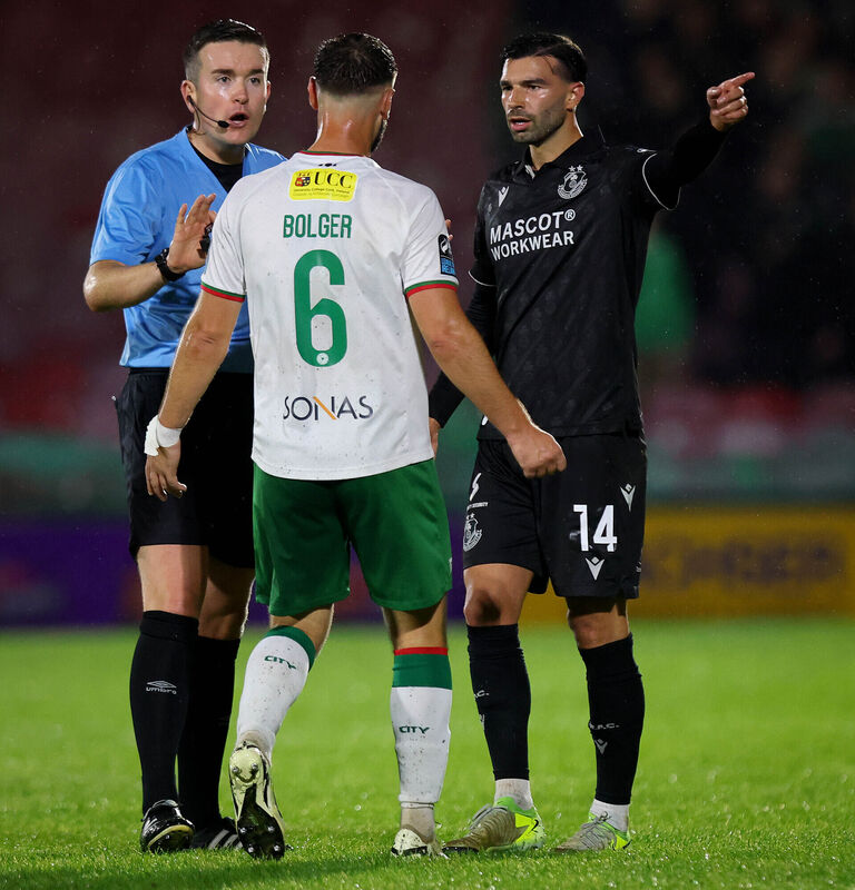 Cork City's Greg Bolger and Danny Mandroiu of Rovers arguing the point on Friday night. Picture: INPHO/Ryan Byrne