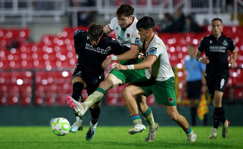 Cork City's Rory Feely and Matthew Kiernan with John McGovern of Shamrock Rovers. Picture: ©Inpho/Ryan Byrne Cork City's Rory Feely and Matthew Kiernan with John McGovern of Shamrock Rovers. Picture: ©Inpho/Ryan Byrne