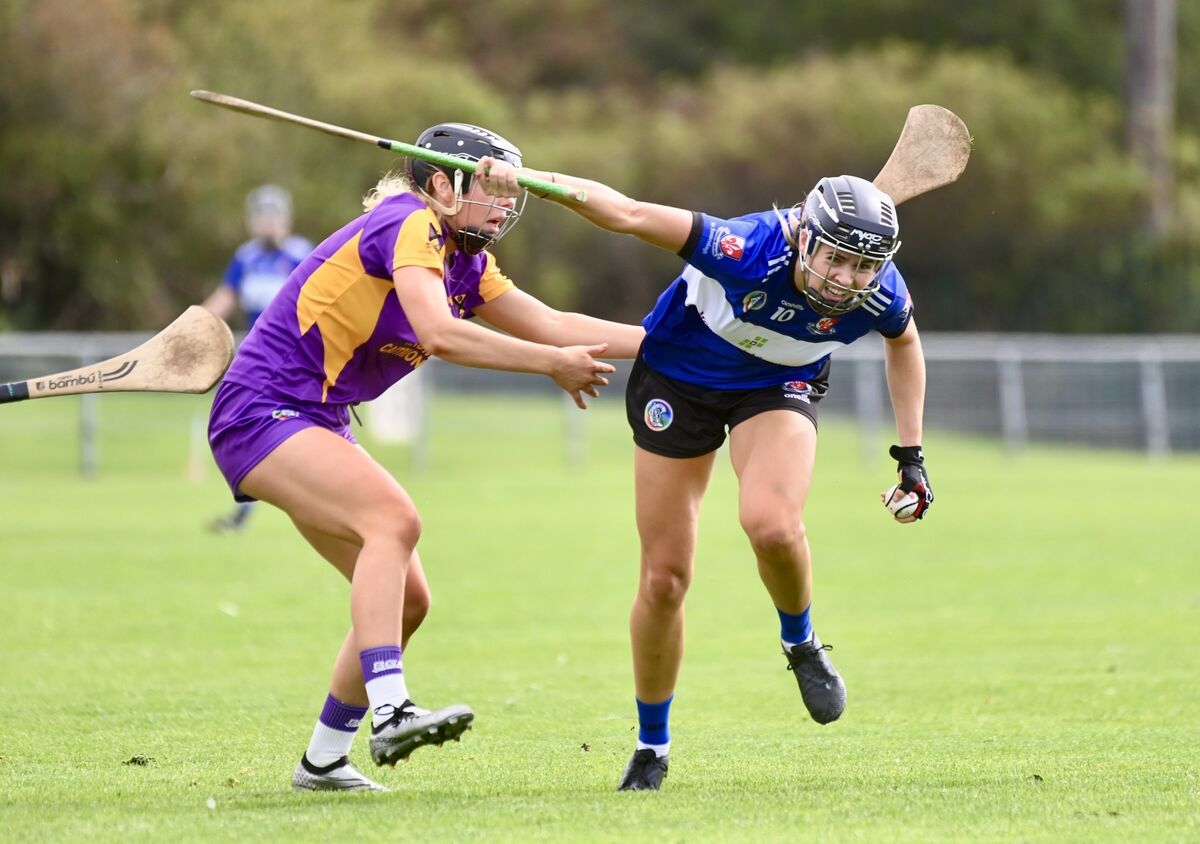  Lucy Allen battles to hold possession for Sarsfield’s against St Catherine’s. Picture: Larry Cummins