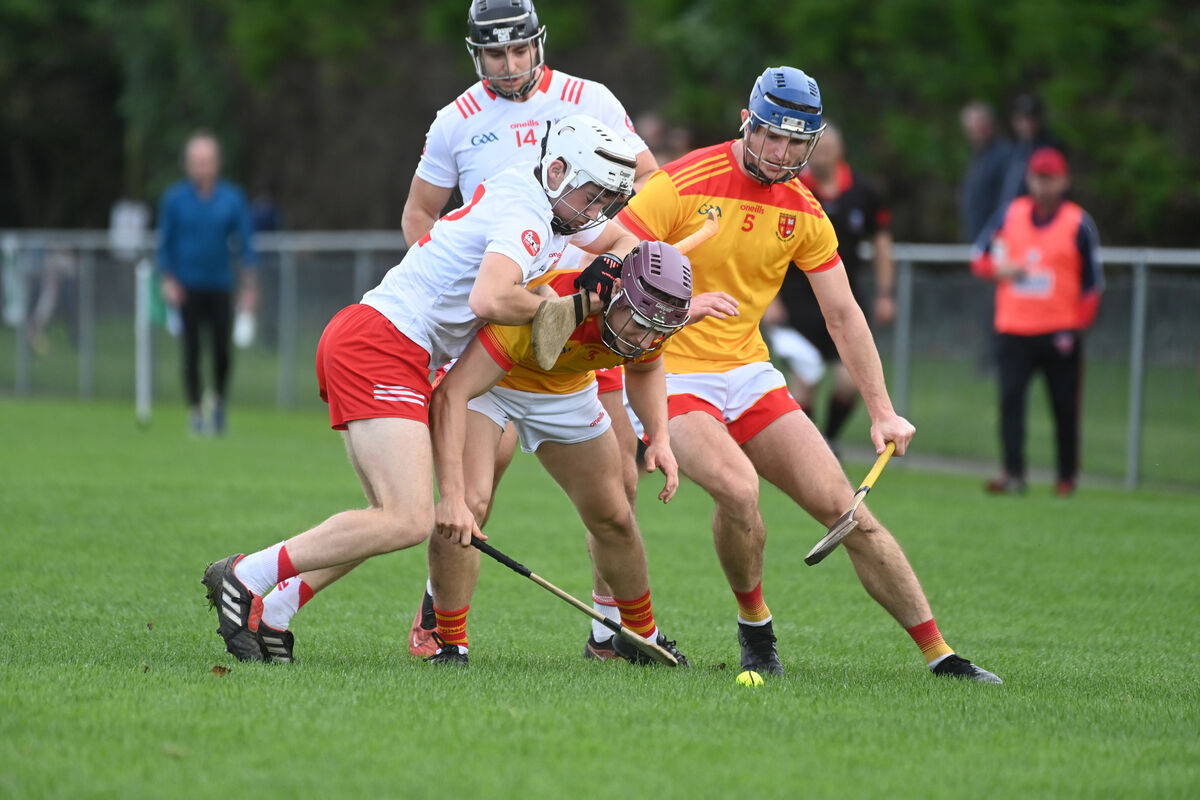  Mallow defenders Gearoid Daly and Garrett Linehan under pressure from Billy McGann, Castlemartyr. Picture: Larry Cummins