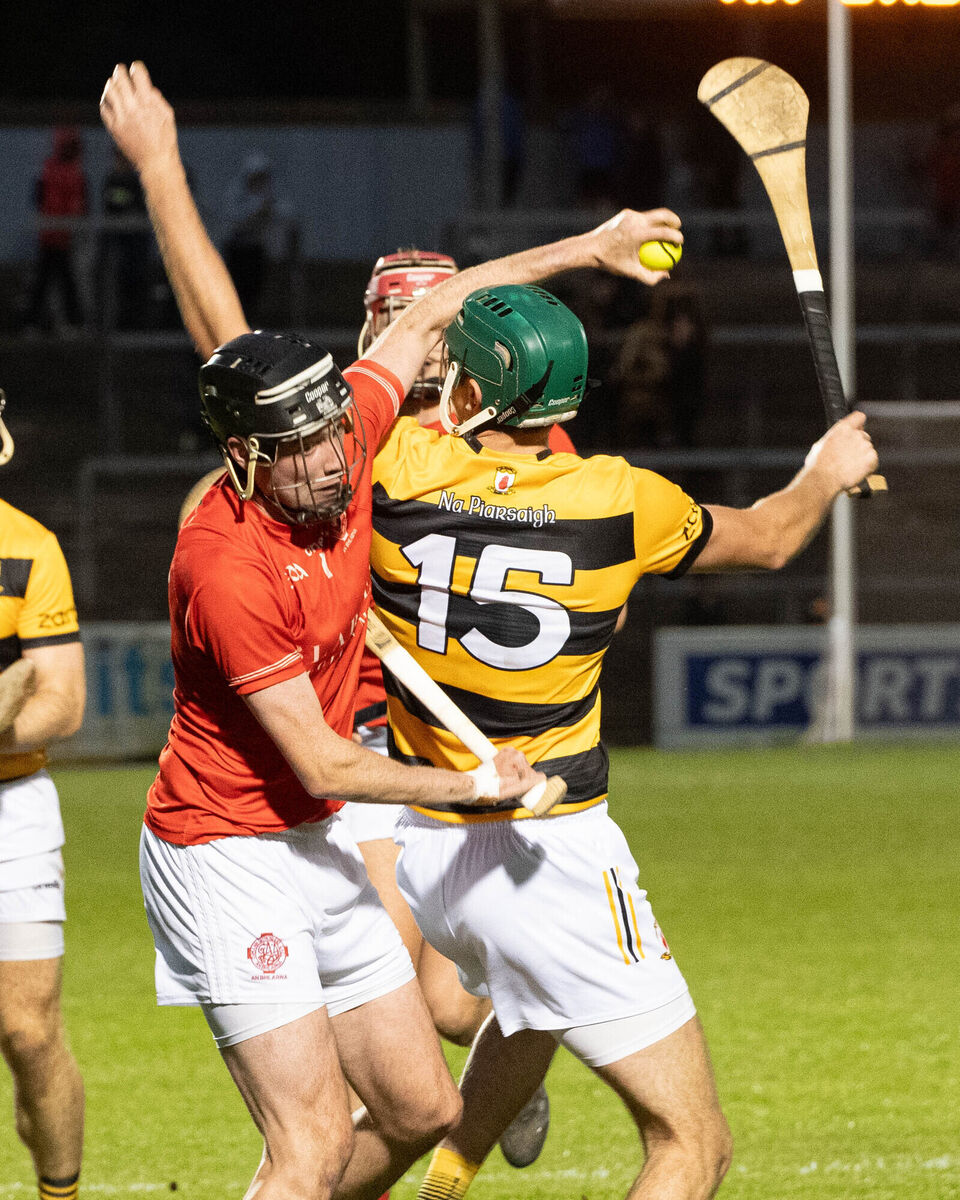 Blarney's Alan McEvoy holds onto the sliothar ahead of Na Piarsaigh's Luke Sheehan. Picture: Howard Crowdy