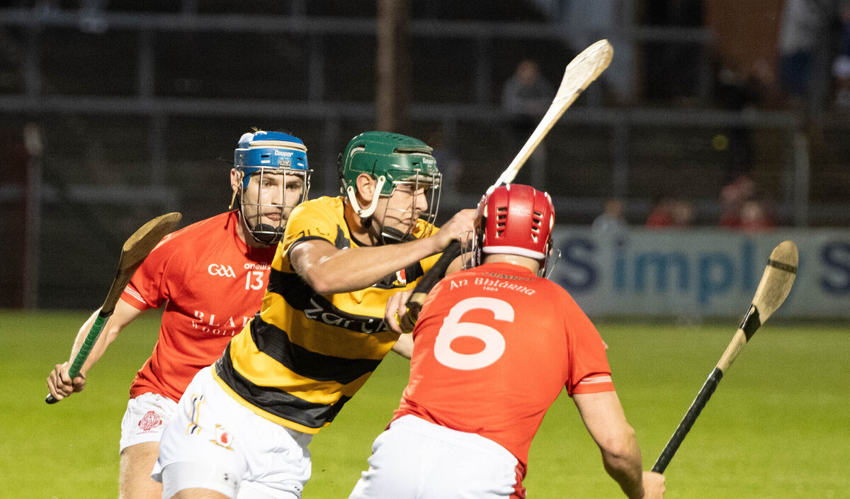 Na Piarsaigh's Lucas Sheehan attempts to get past Shane Mulcahy and Patrick Crowley of Blarney. Picture: Howard Crowdy