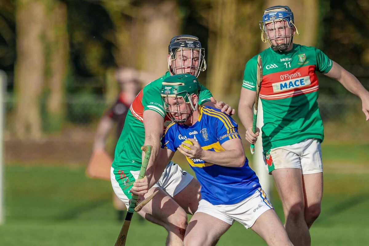 Niall Harte Carrigtwohill breaks away from Conor O'Leary, Fr O'Neills, during their East Cork Oil JAHC Relegation playoff on Saturday. Picture Denis O'Flynn.