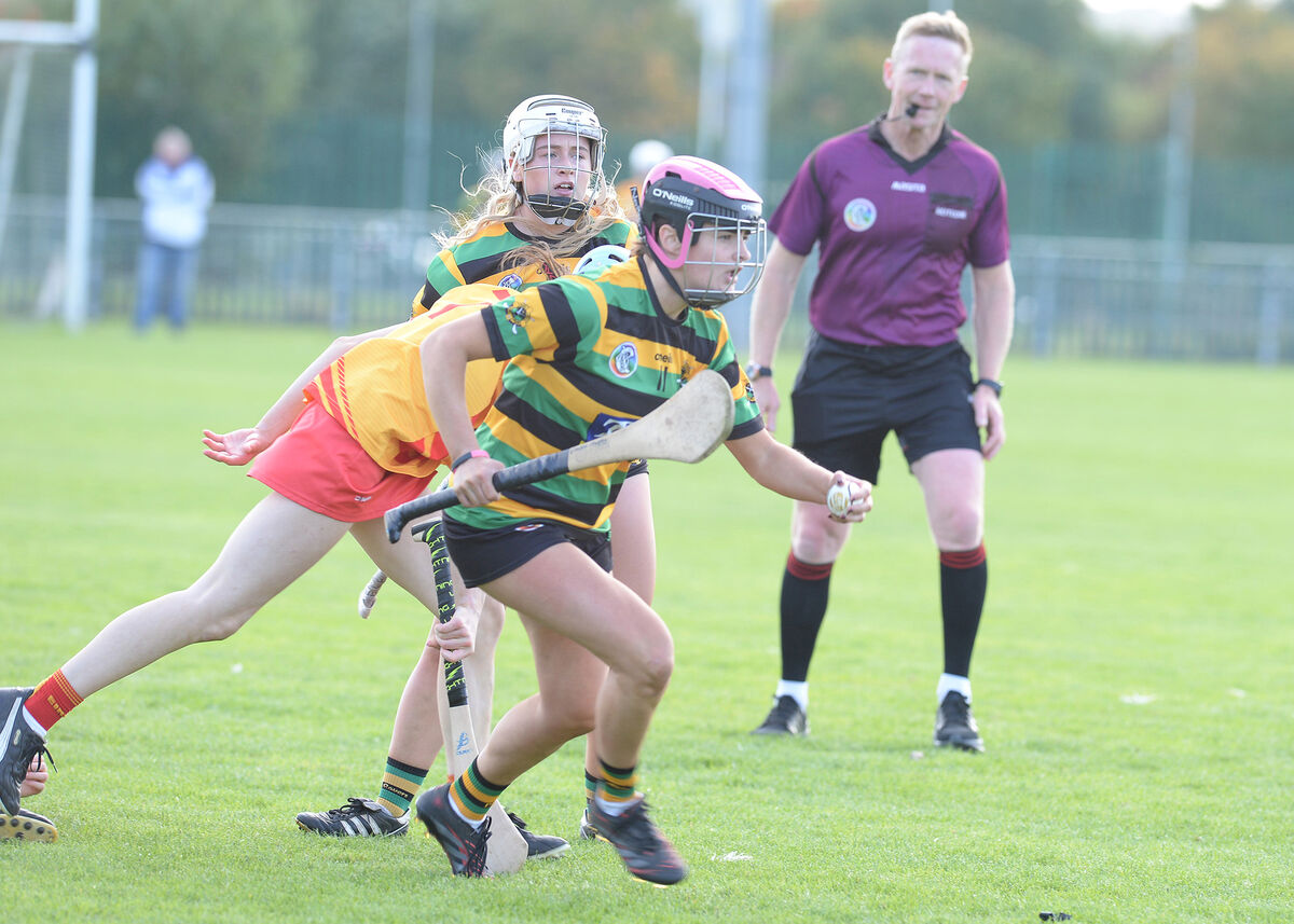 Glen Rovers' Emma Murphy heads goalwards and away from Ally McGrath, Éire Óg, with Abbey Lynch O'Shea providing back up at Castle Road. Picture: Martin Walsh. Glen Rovers' Emma Murphy heads goalwards and away from Ally McGrath, Éire Óg, with Abbey Lynch O'Shea providing back up at Castle Road. Picture: Martin Walsh.