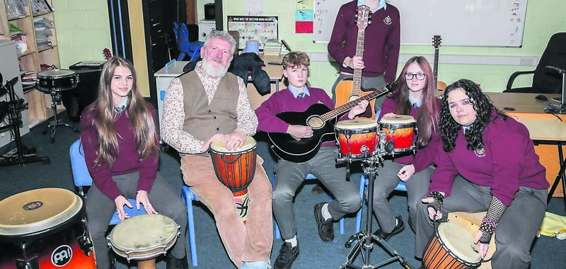 Teacher John Casey with students Julia Kaminska, Sam Blacksheilds, Calum Colohan, Brooke Stanton and Clara Petronilli in the music room at the open night which took place at the community school at Mayfield. Picture: David Creedon
Teacher John Casey with students Julia Kaminska, Sam Blacksheilds, Calum Colohan, Brooke Stanton and Clara Petronilli in the music room at the open night which took place at the community school at Mayfield. Picture: David Creedon