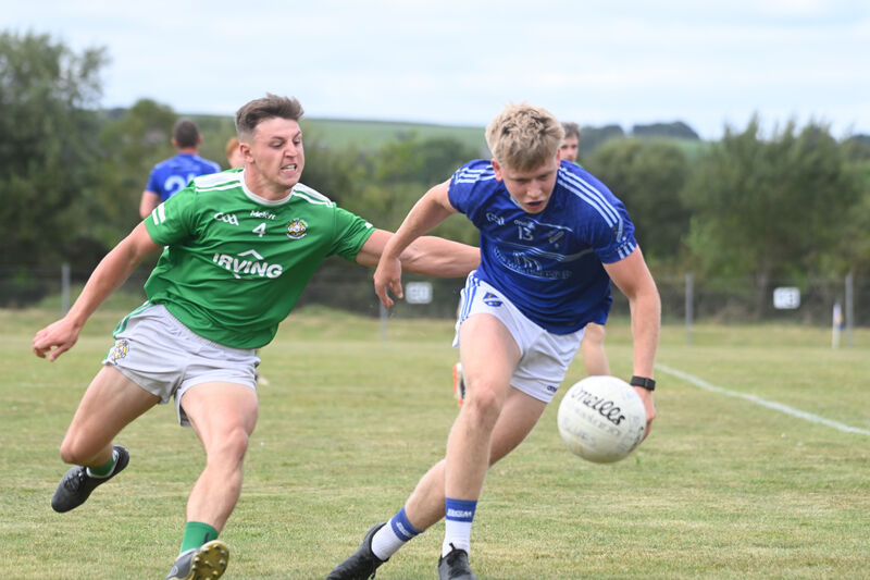  Aghada defender Kyle O'Shea keeps the pressure on Dara Sheedy, Bantry. Picture: Larry Cummins