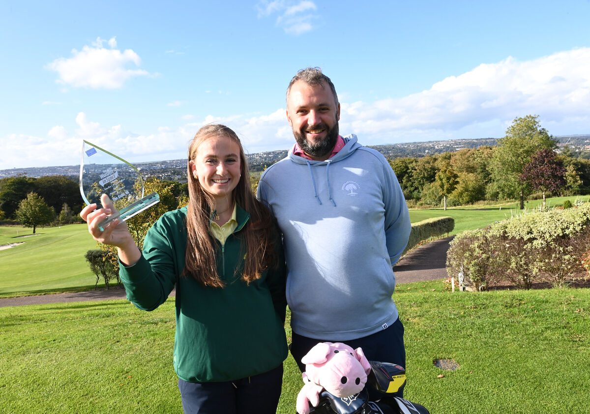 Golfer Claudia O'Donoghue of Douglas Golf Club, Cork with Dave Barry, Club pro and caddy. Picture: Larry Cummins