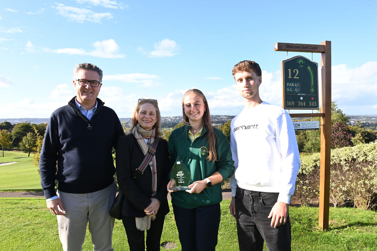 Claudia O'Donoghue of Douglas Golf Club with her parents Ronan and Noreen and brother Seb. Award. Picture: Larry Cummins