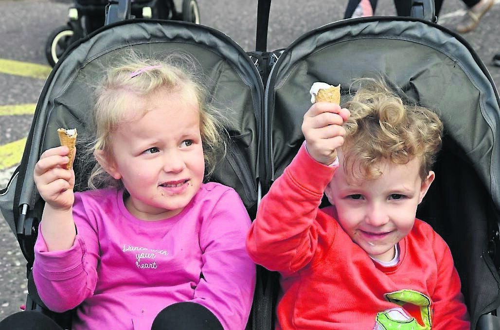 Peigí and Senan Stack enjoying ice cream at the Ballincollig Open Streets event.	Picture: Denis Minihane
                    