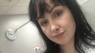 <p>Lorraine in hospital before having an MRI scan. Last year the Cork woman broke a bone in her back. </p>
