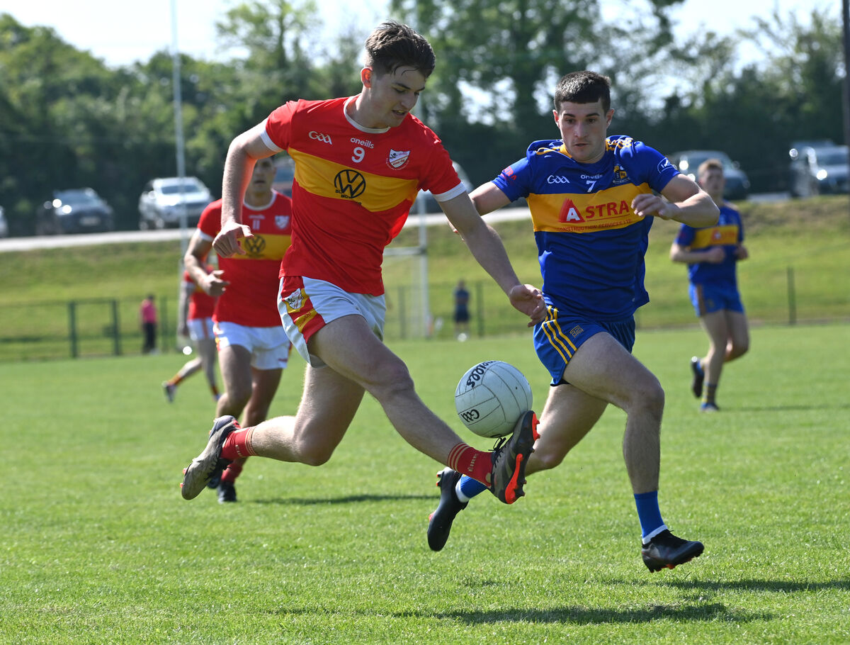  Darragh Clifford of Éire Óg breaking past Kieran McCarthy of Carrigaline this year. Picture: Dan Linehan
