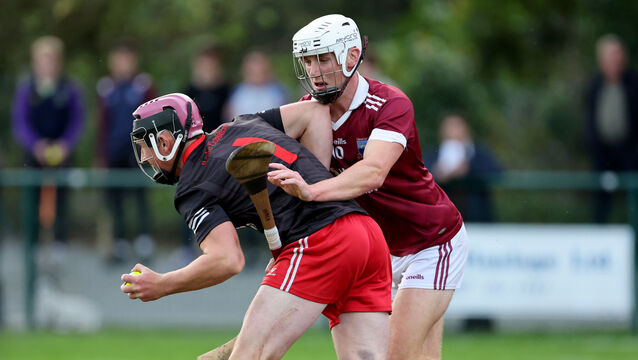 <p> Daniel Mackey, Ballygarvan Goalkeeper, breaks away from Sean Hinchion, Argideen Rangers during their Cork County Premier Junior Hurling Championship at Macroom, Co. Cork.</p>