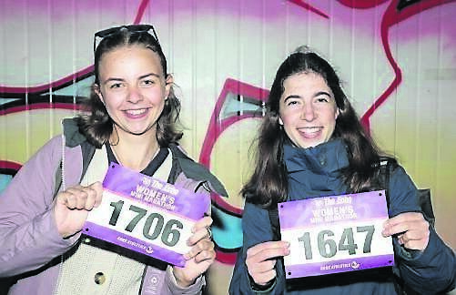 Marthe Schelhorn and Marie Vierhelig from Blackrock collecting their numbers at registration for The Echo Mini Marathon at the Marina Market.	Picture: David Creedon
                    