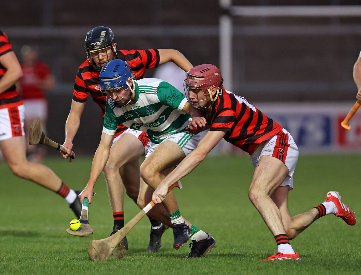  Diarmuid Byrne and Conor Cahill, Cloyne, tackle Shane Ryan, Valley Rovers in their PIHC quarter-final at Páirc Uí Rinn. Picture: Jim Coughlan.