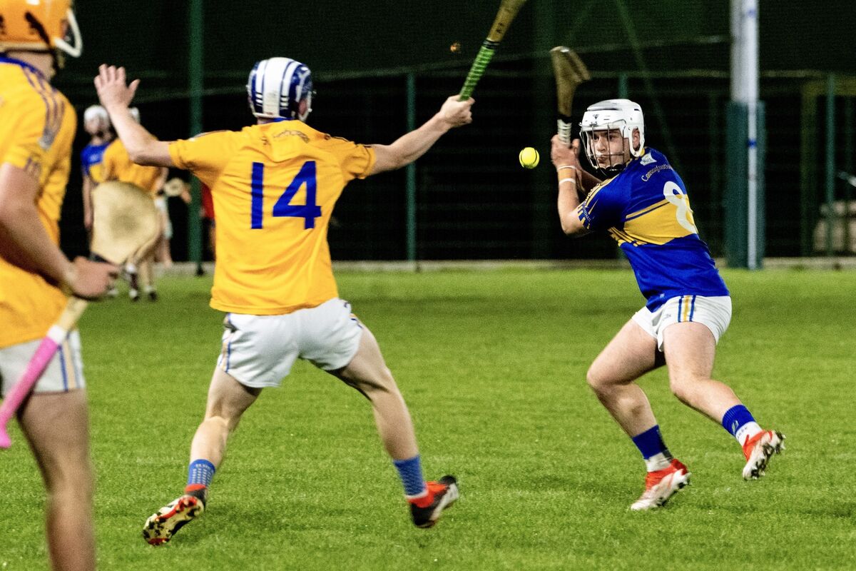 Carrigtwohill's Jarlaith Cullimore clears the sliotar under pressure from St Finbarr's. Picture: Chani Anderson
