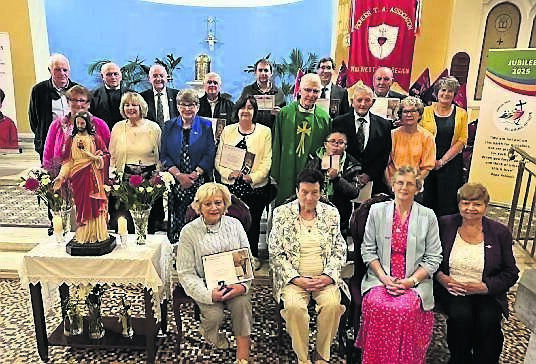 Pioneers at the Diocesan Pioneer Mass in Carrigaline, including members who received Diamond and Gold pins and certificates, a new life member and new youth member, all presented by Monsignor Aidan O’Driscoll VG coPP. Also included are officers and members of the Diocesan and Regional Councils of the PTAA.