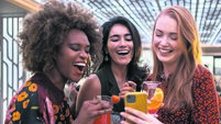 Friends Having a Laugh in the Bar