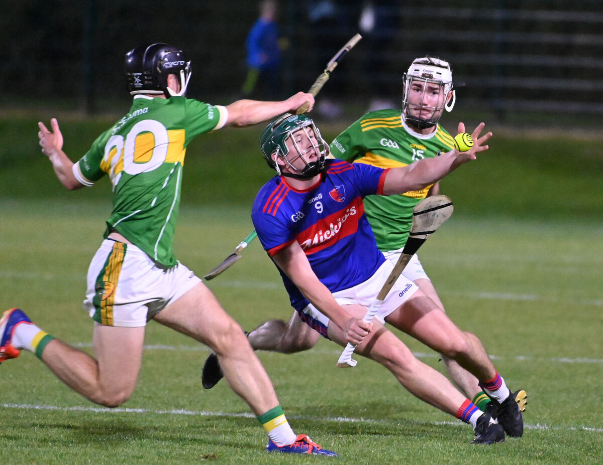 Erin's Own's Oran O'Regan gathers the sliotar from Newtownshandrum's Stephen Minihane and Ronan Geary. Picture: Eddie O'Hare Erin's Own's Oran O'Regan gathers the sliotar from Newtownshandrum's Stephen Minihane and Ronan Geary. Picture: Eddie O'Hare
