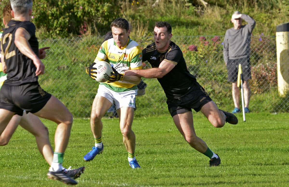  Carbery Rangers' John O'Rourke is tackled by Valley Rovers' Adam Kenneally. Picture: Denis Boyle