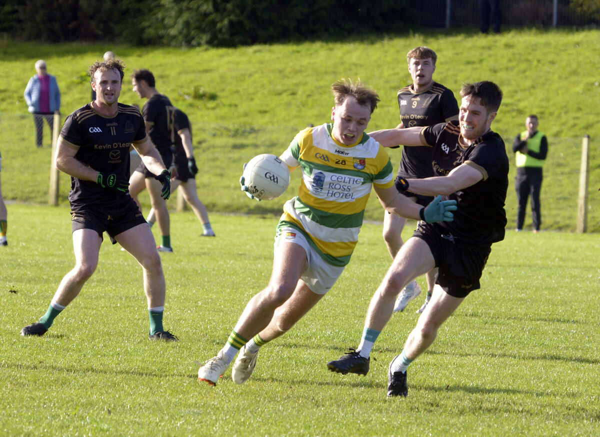  Carbery Rangers' Daragh Hayes holding off the challenge of Cian O'Keeffe of Valley Rovers. Picture: Denis Boyle