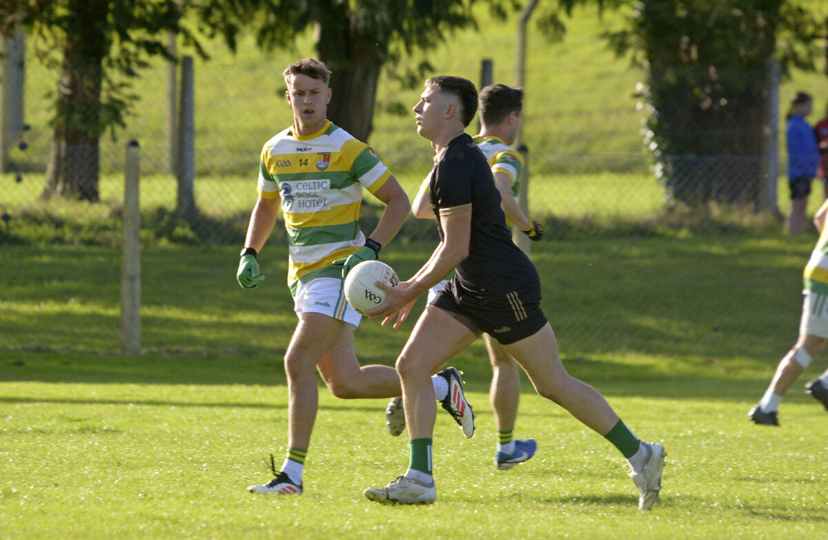 Carbery Rangers' Conor Twomey chasing after Valley Rovers' Adam Walsh-Murphy. Picture: Denis Boyle
