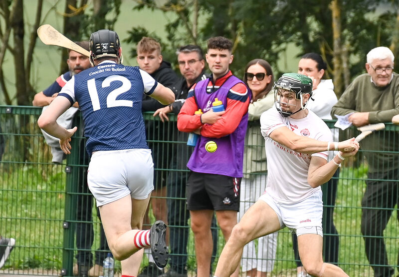  Blarney's Mark Coleman scores from distance as Watergrasshill's Liam Foley closes in. Picture: David Keane
