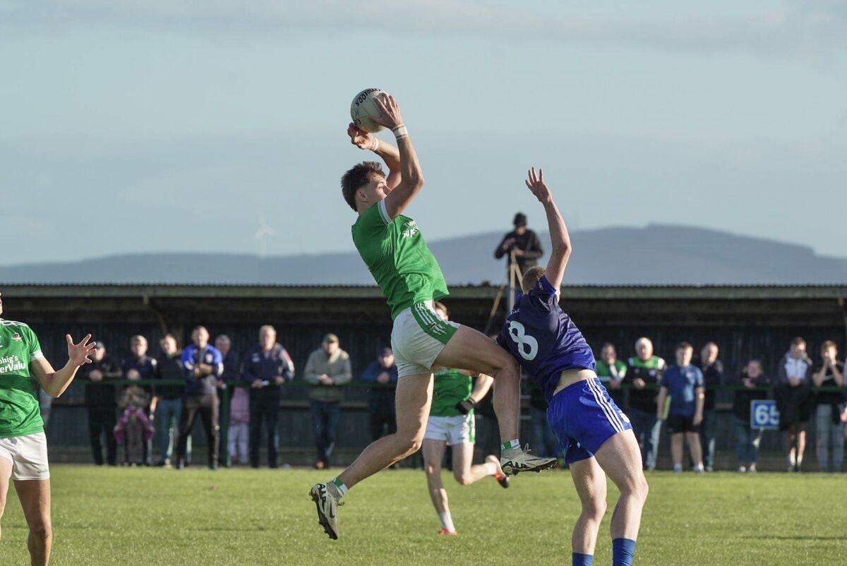 Ian Walsh of Kanturk claims the ball over Knocknagree's David O'Connor. Picture: Noel Sweeney