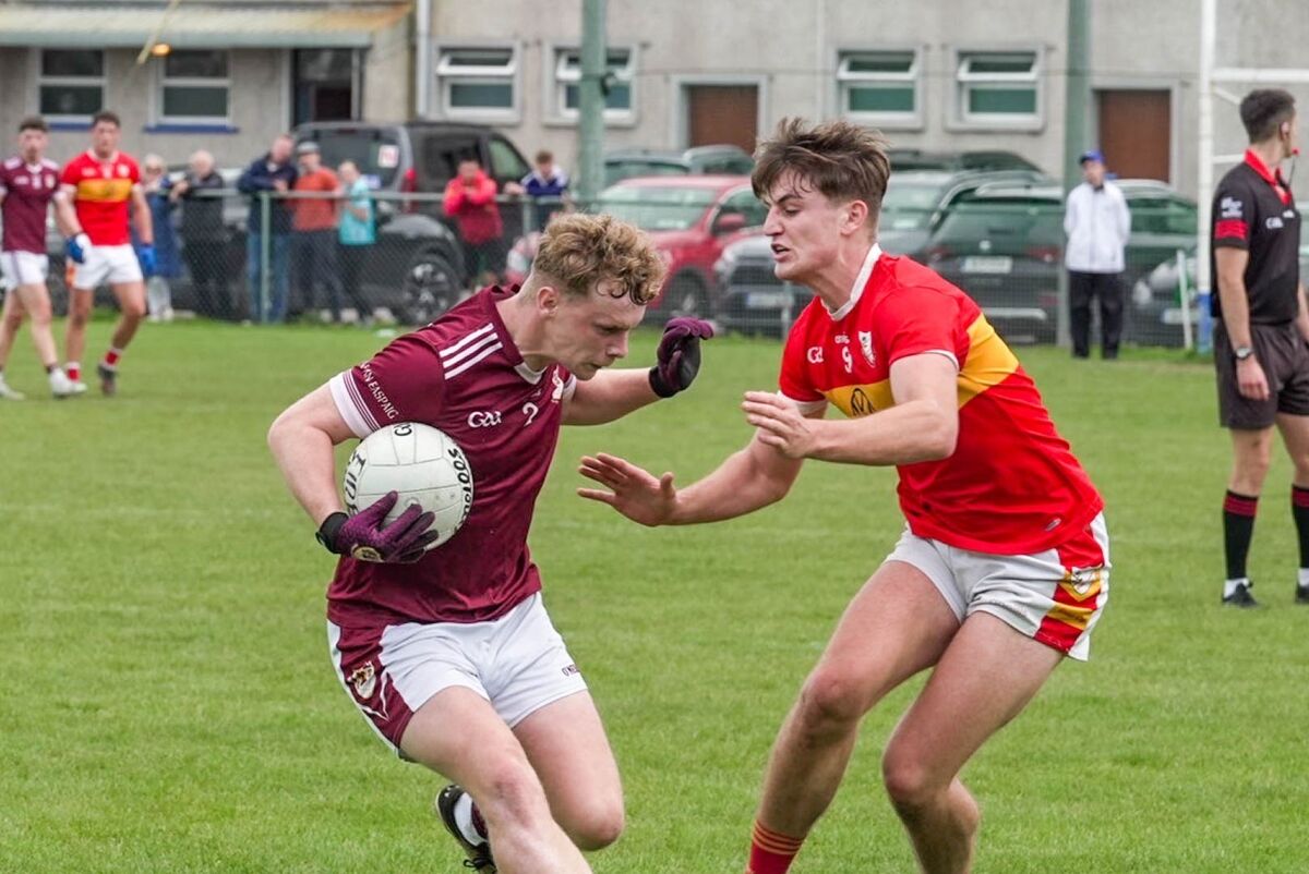 Bishopstown’s Liam Hogan holds off Eire Óg’s Darragh Clifford. Picture: Noel