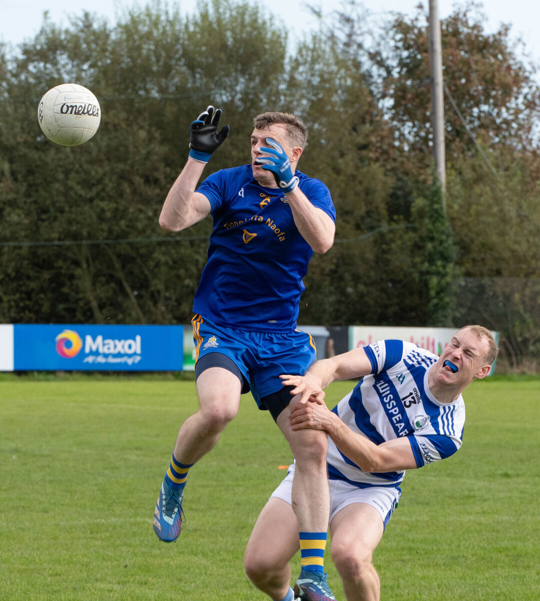 St Finbarr's Alan O'Connor about to gather a high ball ahead of Castlehaven's Cathal Maguire. Picture: Howard Crowdy