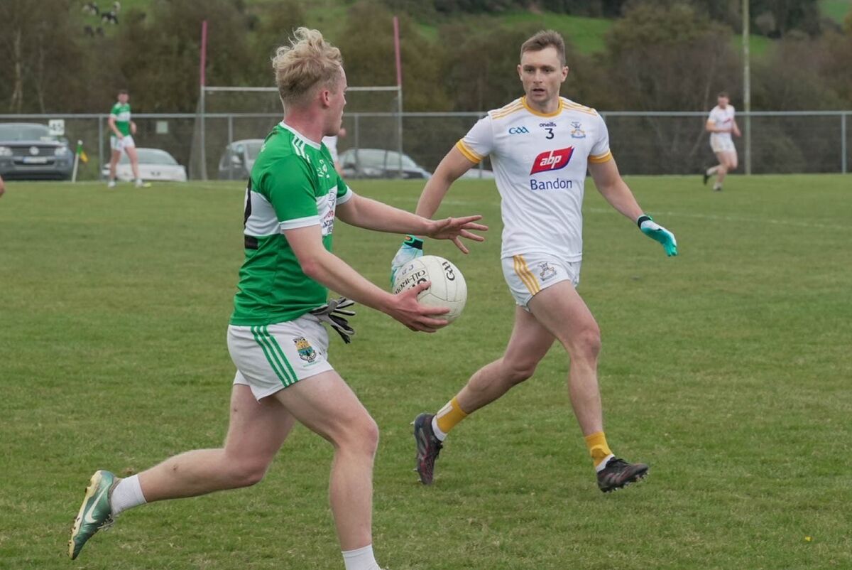 Bandon's Brian Crowley tries to close down Mark Hunt of Macroom in Sunday's McCarthy Insurance Group Premier IFC relegation play-off in Kilmurry. Picture: Noel Sweeney