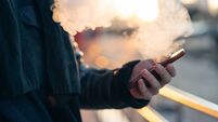 Using mobile phone at golden hour